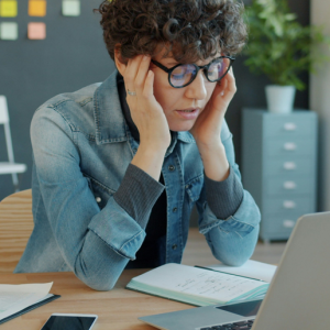 Overwhelmed finance professional struggling with accounting workload needing to hire an accounting assistant
