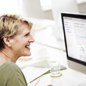 salesforce-admin-recruiter-candidate-review Salesforce admin placed by the Salesforce staffing experts at VALiNTRY reviewing client data on a Salesforce dashboard